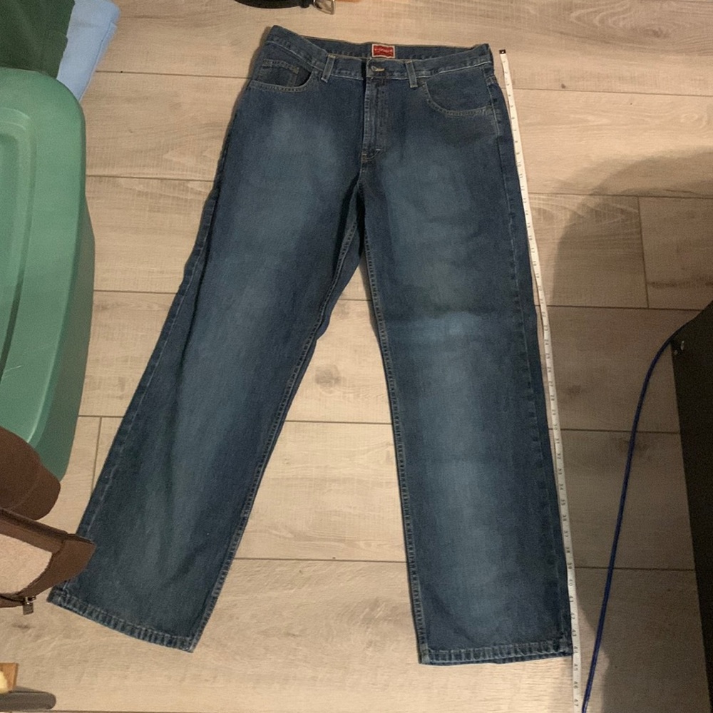 Blue denim Tommy Hilfiger baggy jeans (W34 X length is told on the screen)